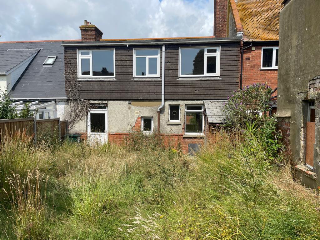 Lot: 153 - THREE-BEDROOM CHALET BUNGALOW WITH GARAGE FOR IMPROVEMENT - Rear elevation
